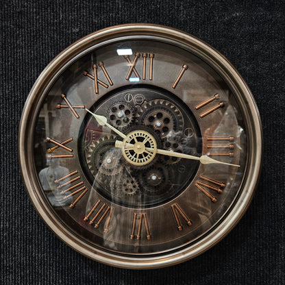 Decorative clock with Roman numerals and visible gears on a black background
