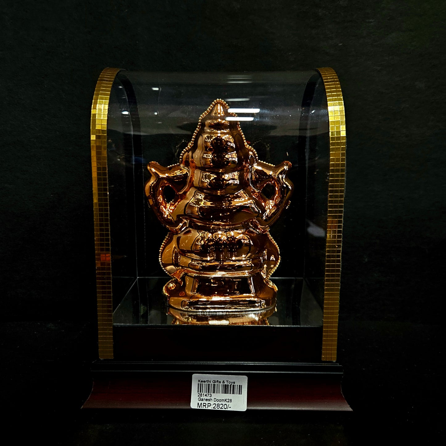 24 carat gold Plated vinayaka idol with stone designer,transparent protective cabin