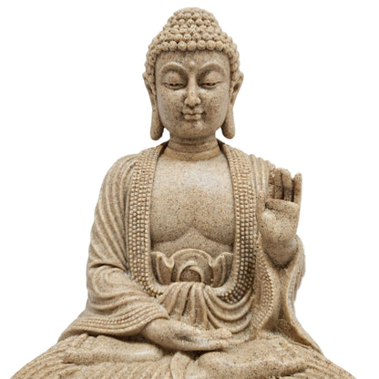 This sand-finished Buddha showpiece is crafted from durable polyresin and features a serene meditation pose