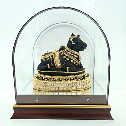 24 carats gold Plated Nandi statue idol Decorated with attractive stones in a transparent protective cabin