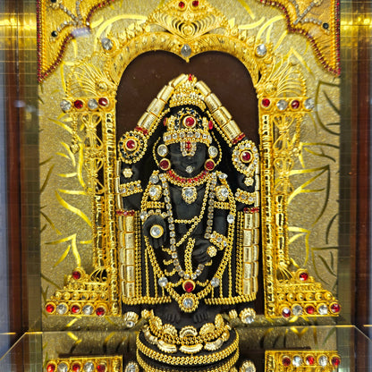 Lord Balaji decorated with attractive stones 24 carats gold Plated idol Statue in a transparent protective cabin