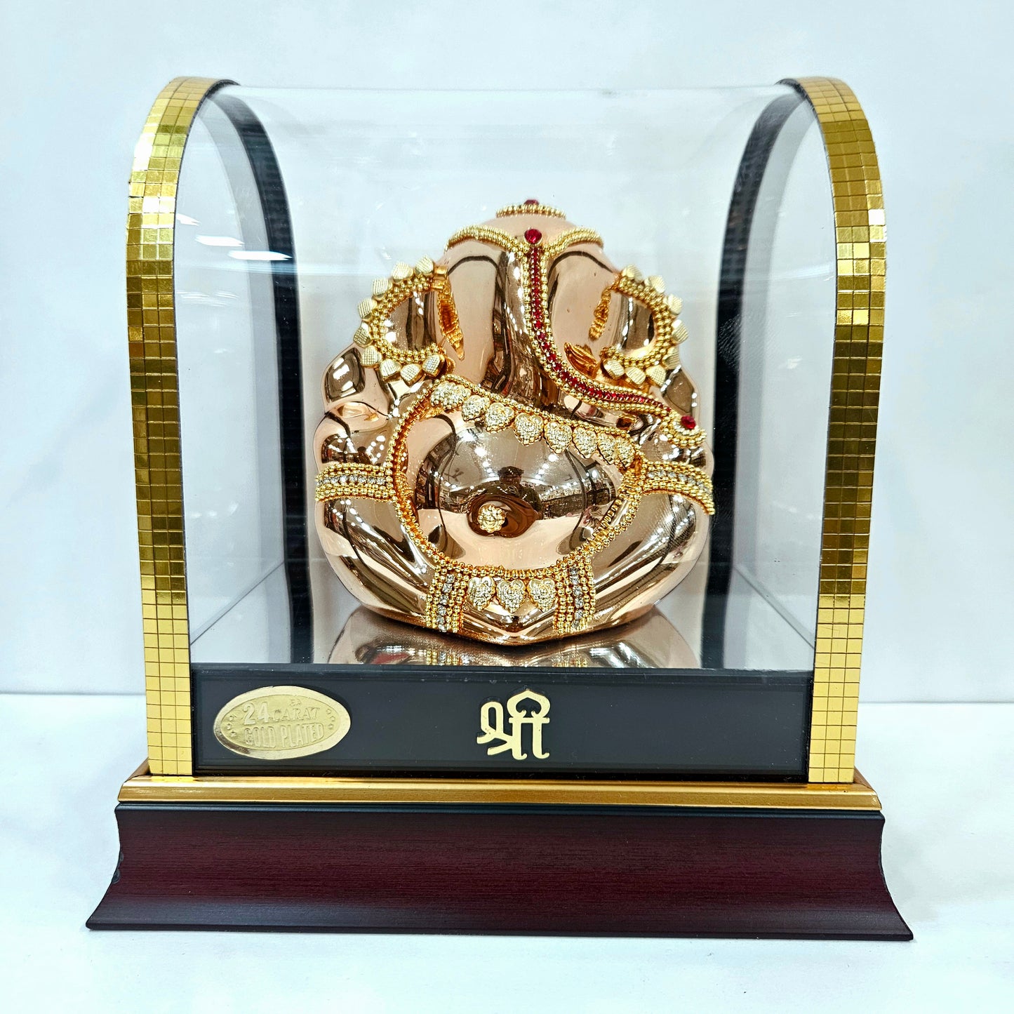 Lord vinayaka murti 24carats gold Plated idol Statue in a transparent protective cabin