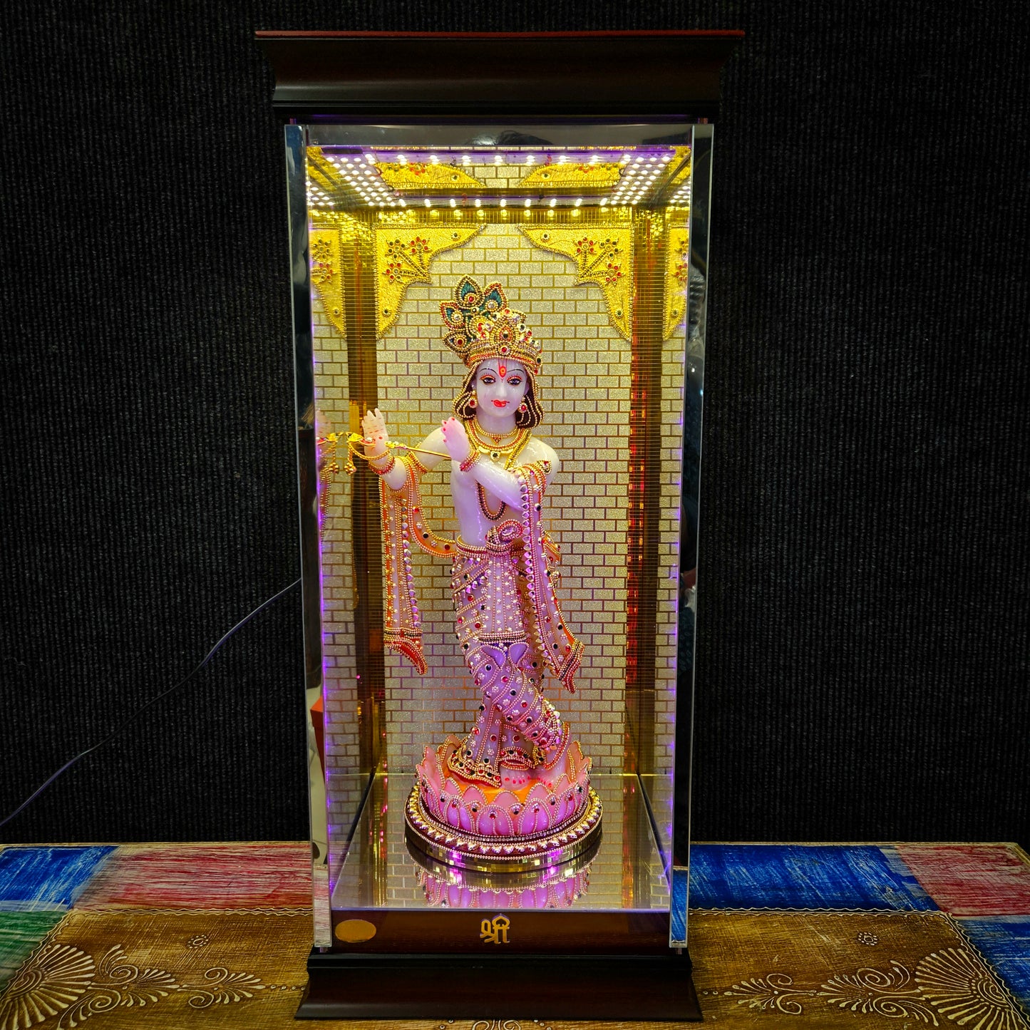 24carats gold Plated Krishna Statue idol Decorated with attractive stones in a transparent protective cabin