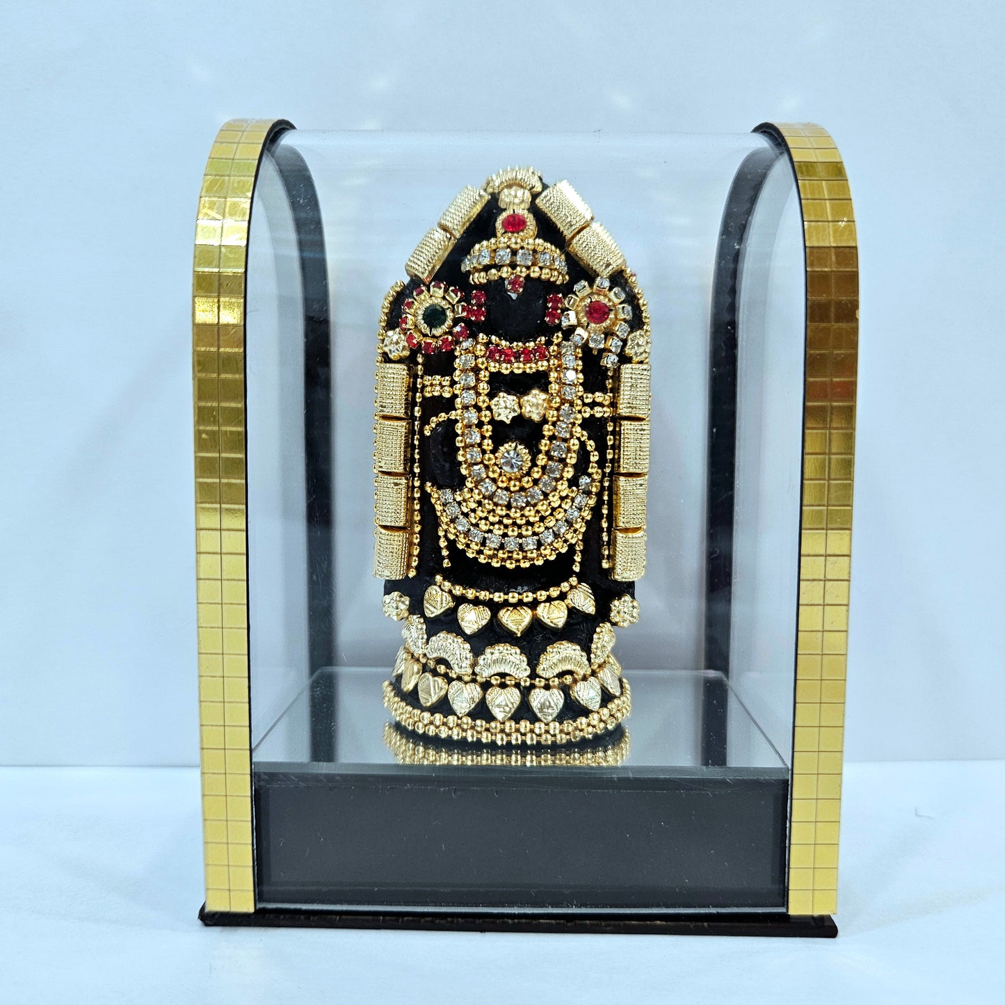 24 carats gold Plated Lord Balaji decorated with stones in transparent protective cabin