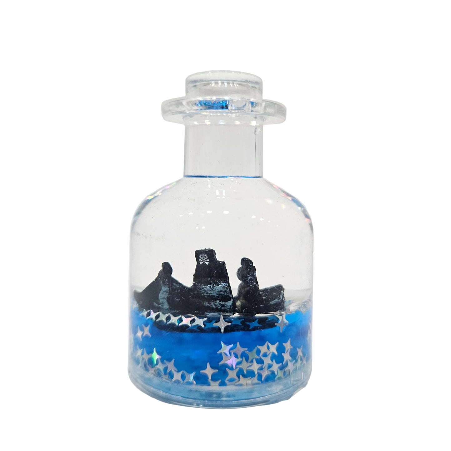 Decorative "drift bottle" showpiece containing a floating pirate ship model in blue liquid Showpiece Figurine