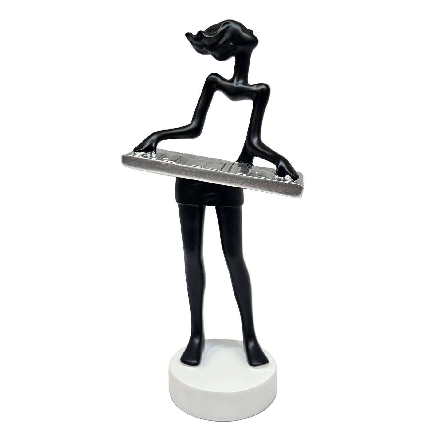 Sleek black modern art lady sculpture of a musician playing a silver keyboard