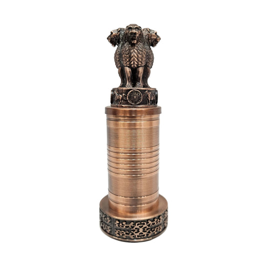 Metal showpiece features the Ashoka Stambh, the National Emblem of India, in an antique bronze finish