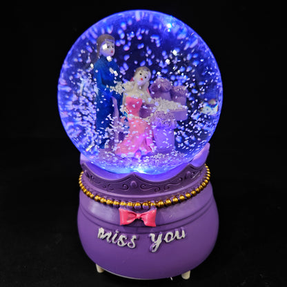 Good looking love Couple missing eachother in a glass dom with multi colour lighting & snow effect