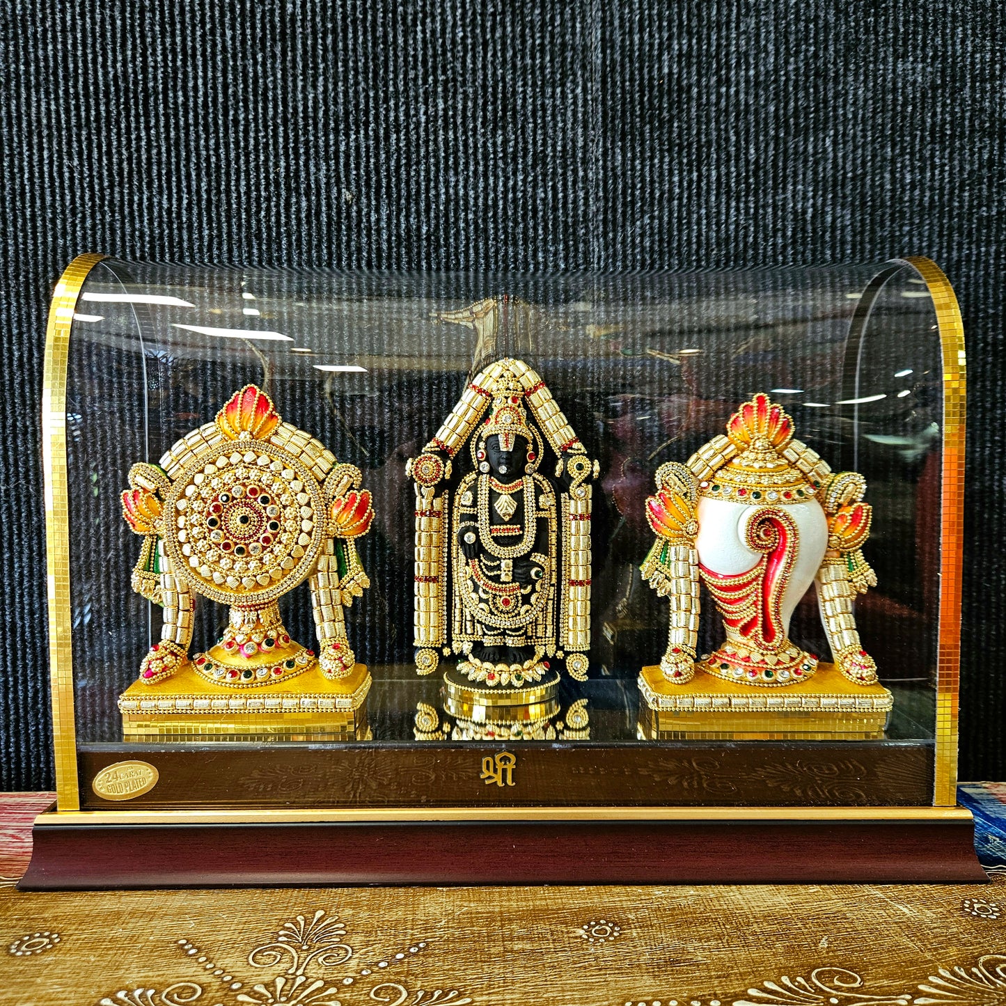 Lord Balaji with shank Chakra Decorated with attractive stones in transparent protective cabin