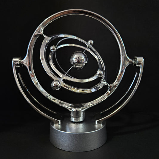 Amazing Orbital Revolving Gadget Perpetual Motion Desk Art Toy Office Decor