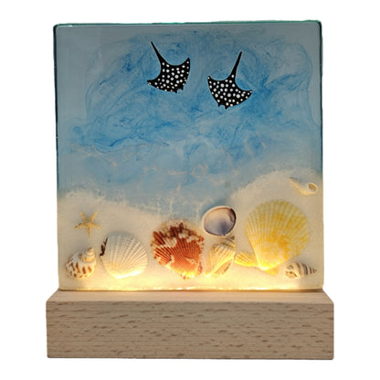 Decorative tabletop display features ocean resin art on a light wood base Showpiece Figurine
