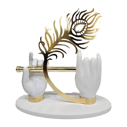 Lord Krishna hand idol features white resin hands holding a flute and a prominent peacock feather Showpiece