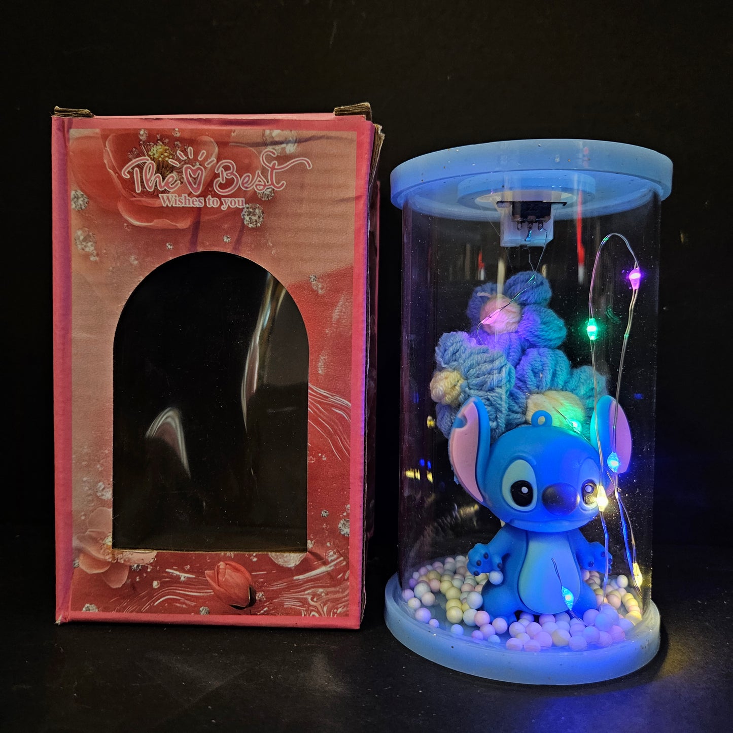 Stitch cartoon character Figurine in a capsule with lighting perfect for couple gifting