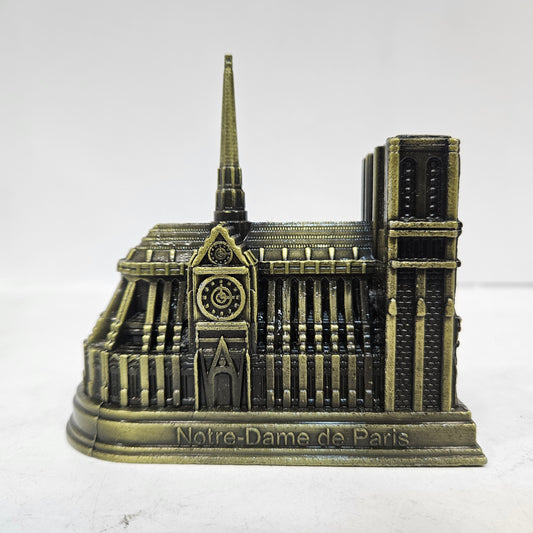 Model of Notre-Dame de Paris on a white background