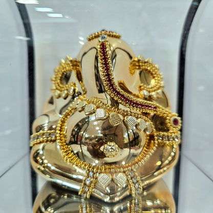 Lord vinayaka murti 24carats gold Plated idol Statue in a transparent protective cabin