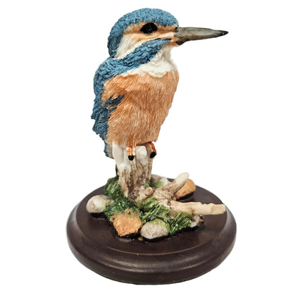 kingfisher figurine, featuring a blue and orange bird perched on a wooden base