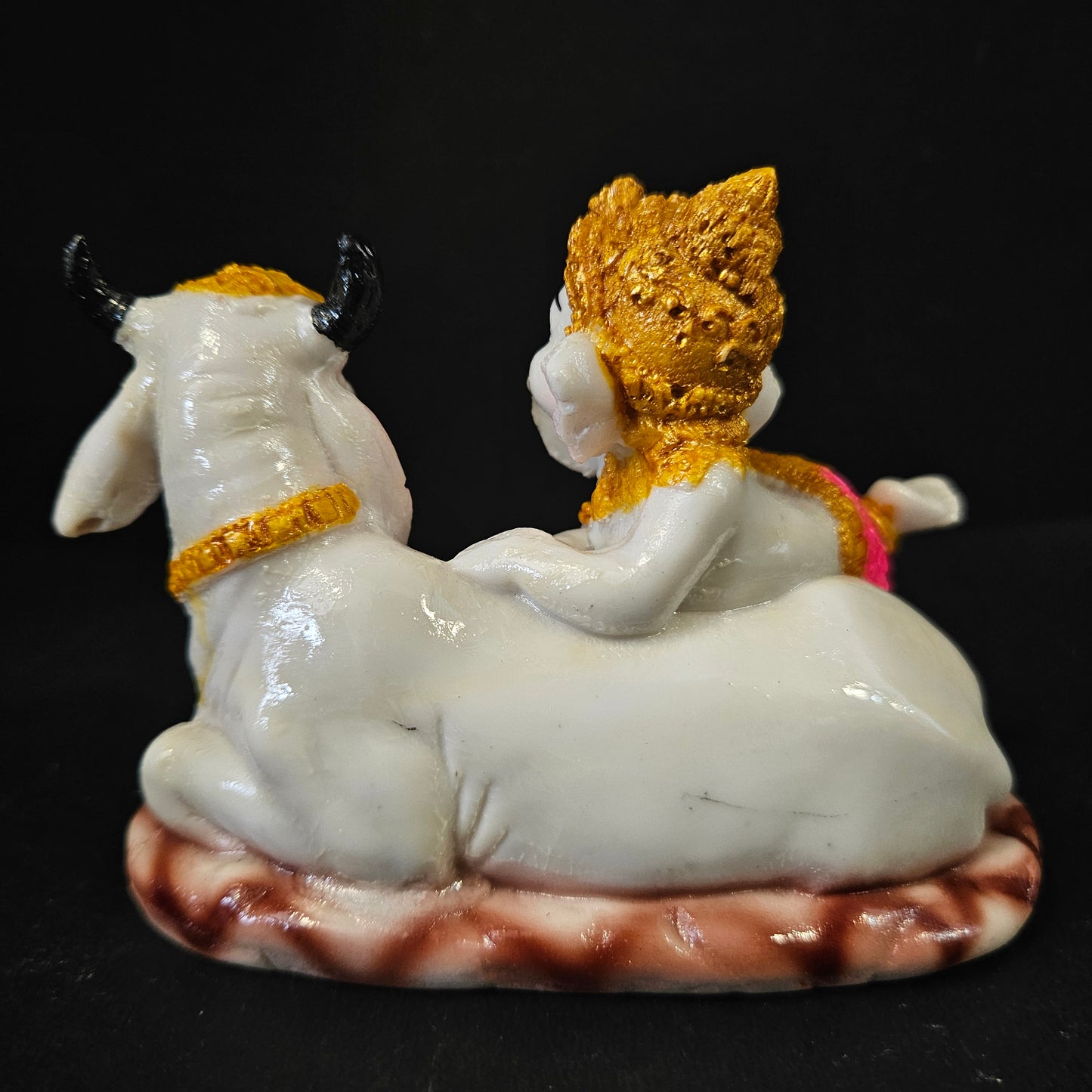 Handcrafted Polyresine Lord Ganesha on Cow Decorative Showpiece, Best for Home Decor