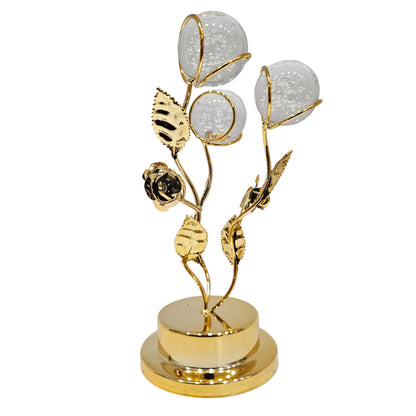 Golden floral metal showpiece features crystal glass globes with delicate bubbles