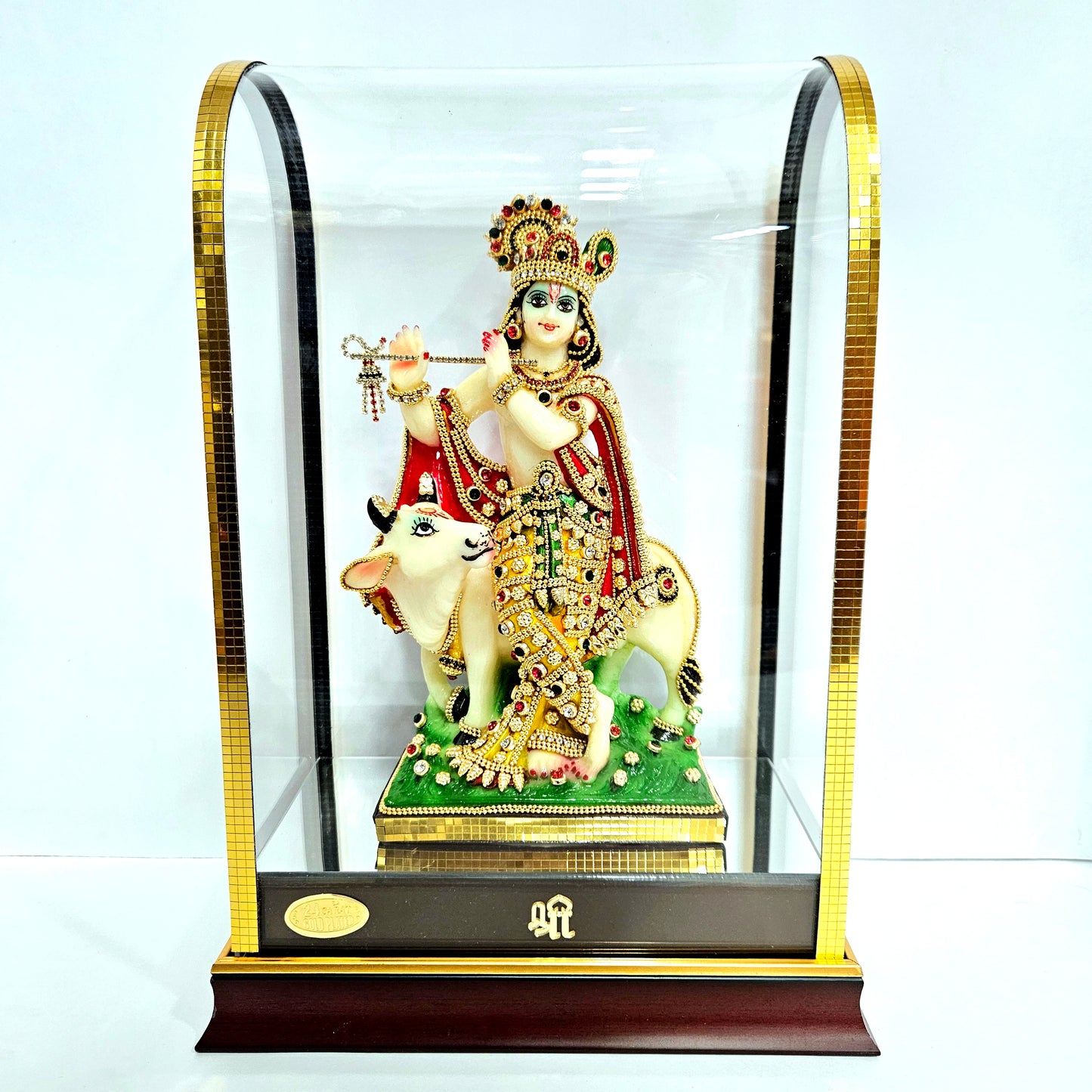 24 carats gold Plated stones designer Krishna Idol Statue Showpiece in transparent protective cabin