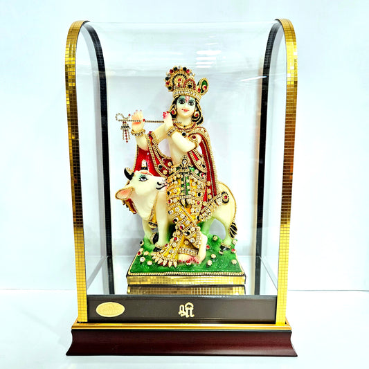 24 carats gold Plated stones designer Krishna Idol Statue Showpiece in transparent protective cabin