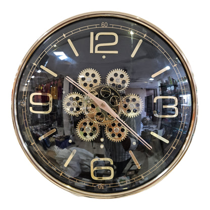 Decorative wall clock with gear design on a white background