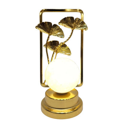 Modern gold metal ginkgo leaf tabletop light ornament, commonly used as a bedside night light or luxury home decor