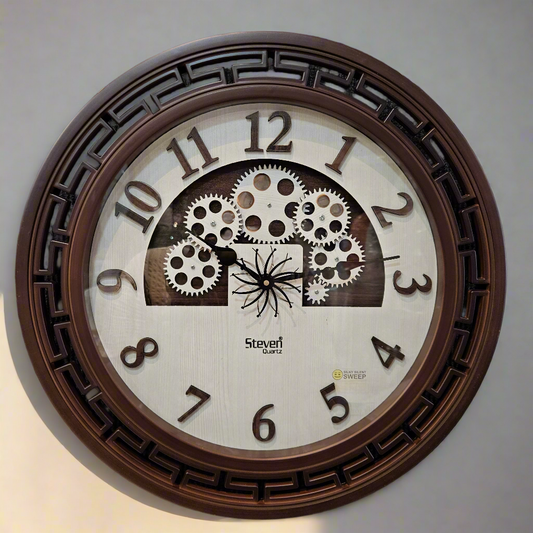 Wall clock with gear design and brand logo on a dark background