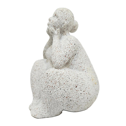 white resin decorative figurine depicts a sitting woman with a speckled texture, suitable for modern home decor