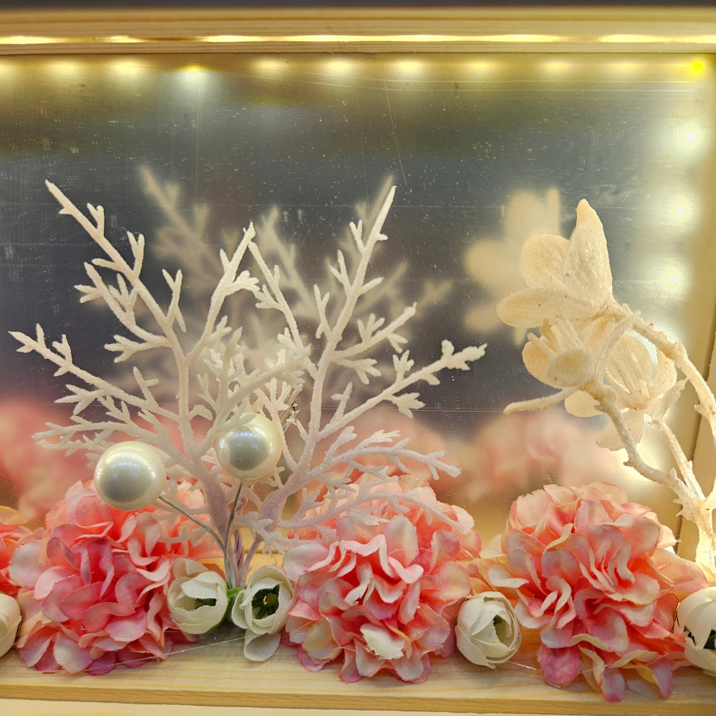 Decorative wooden panel with artificial flowers and LED electric lamp