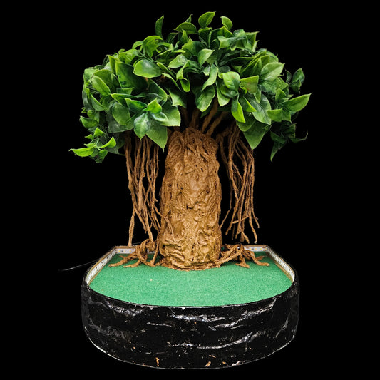 Decorative sculpture of a tree, possibly inspired by a banyan or baobab, featuring an intricate trunk and hanging aerial roots.