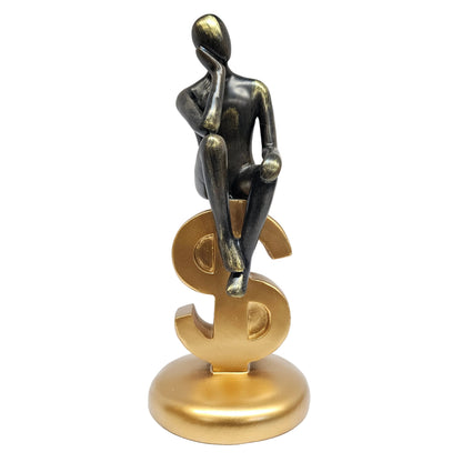 Modern abstract "Thinker" statue a man  sitting on top of a gold dollar sign base