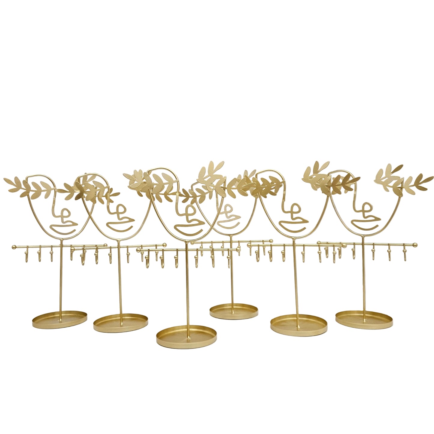 Abstract wire face jewelry stand designed to organize and display accessories like necklaces, rings, and earrings