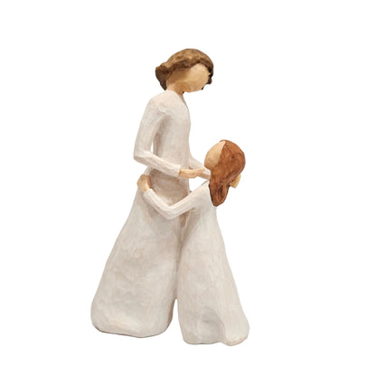 Mother and Daughter" figurine features a sculpted, hand-painted scene of two figures embracing in white robes
