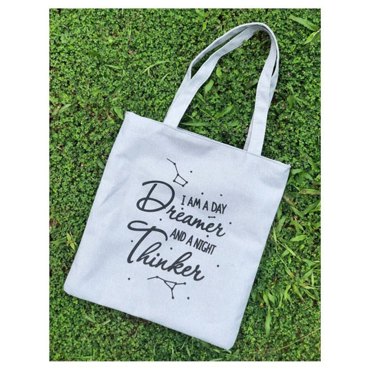 White tote bag with text on 