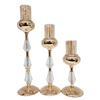 Metal candle holders a polished gold finish and crystal acrylic accents, perfect for wedding decor or table centerpieces
