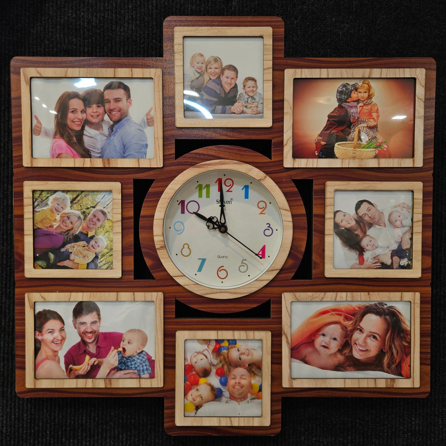 Wooden clock with family photos arranged around it on a dark background