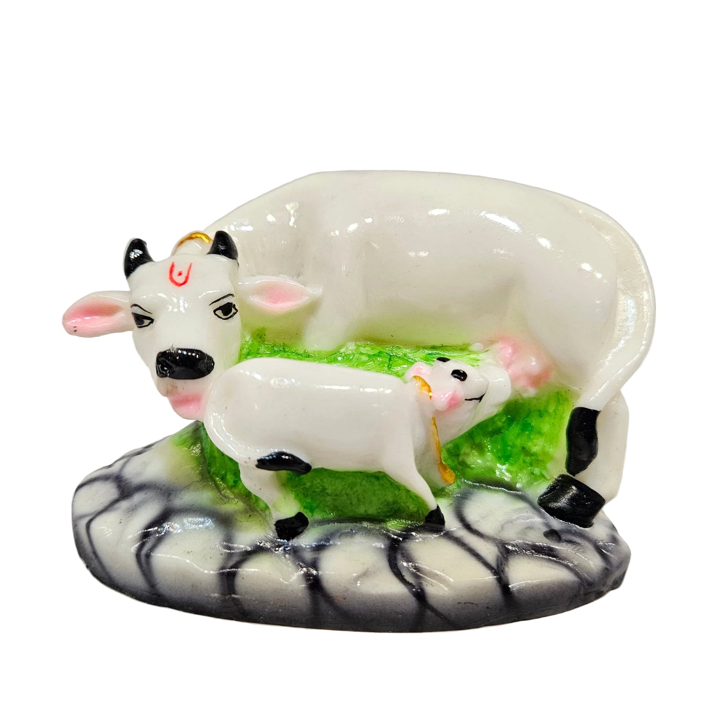 Decorative ceramic Kamadhenu Cow with Calf statue, commonly used in Hindu worship rooms or for home decor