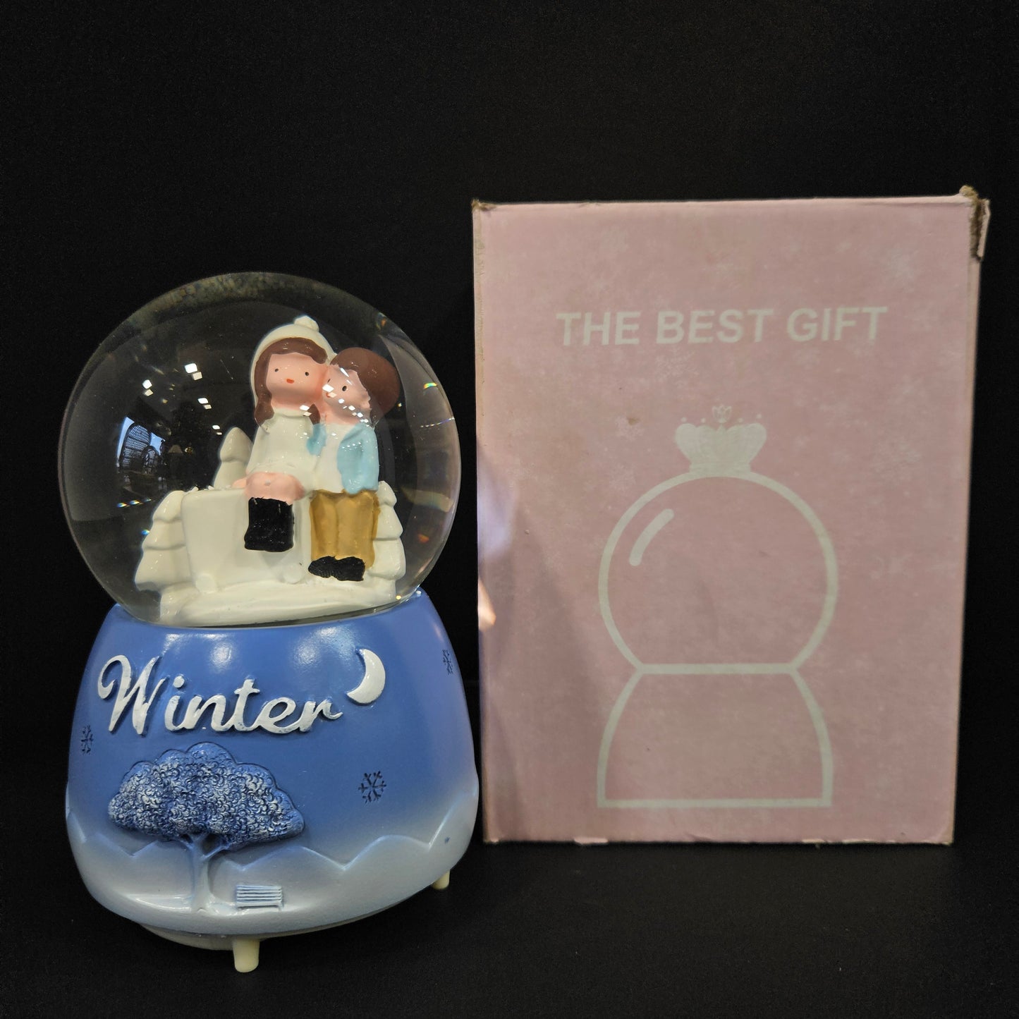 Beautiful love Couple with winter themed multi colour lighting snow Globe