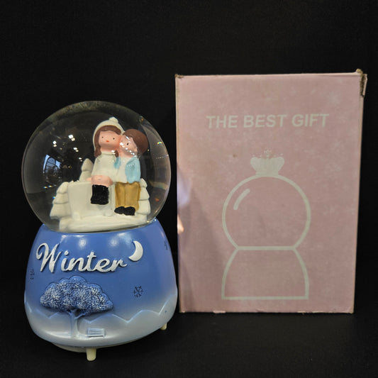 Beautiful love Couple with winter themed multi colour lighting snow Globe