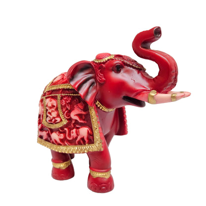 Red and golden fiber elephant statue featuring intricate carvings on the saddle for interior decor Showpiece Figurine