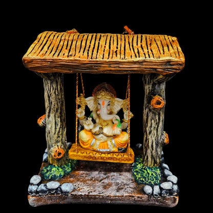 Polyresin Lord Ganesha Idol Resting On A Swing statue Showpiece