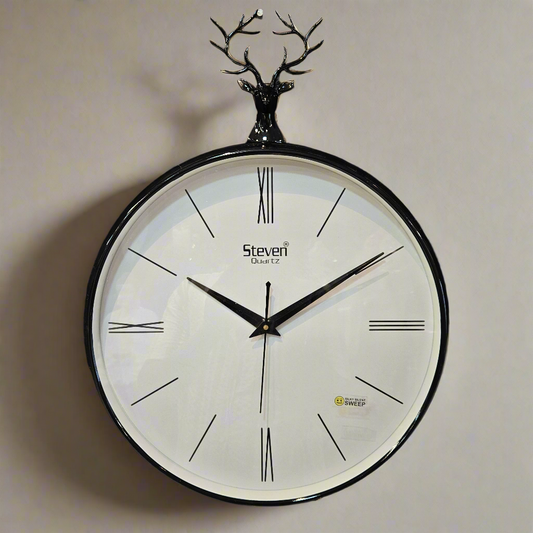 Round wall clock with black Roman numerals on a dark background