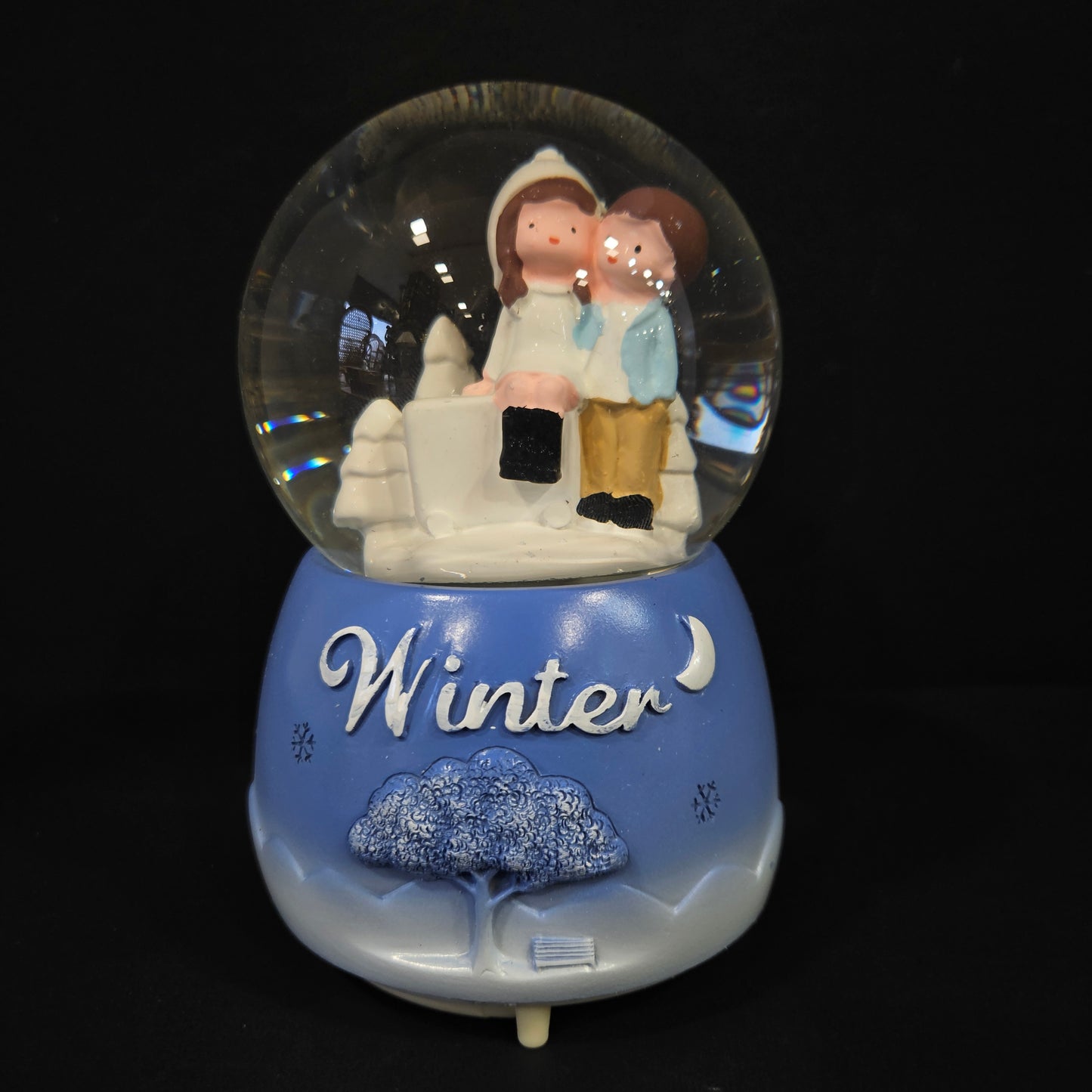 Beautiful love Couple with winter themed multi colour lighting snow Globe