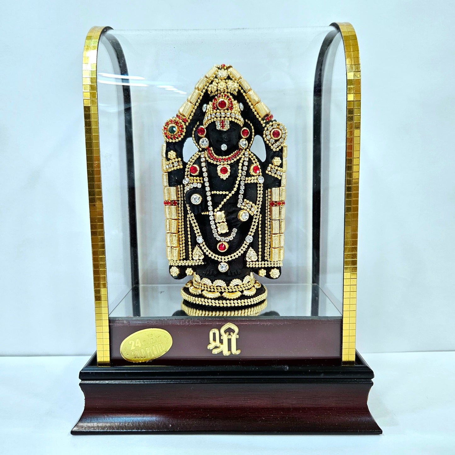 24 carats gold Plated Balaji Idol Statue Decorated with attractive stones designed in a transparent protective cabin