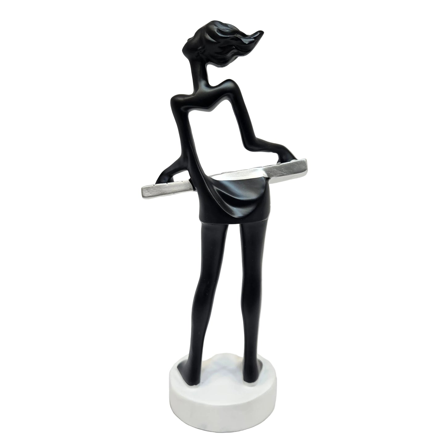 Sleek black modern art lady sculpture of a musician playing a silver keyboard