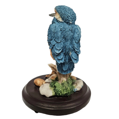 kingfisher figurine, featuring a blue and orange bird perched on a wooden base