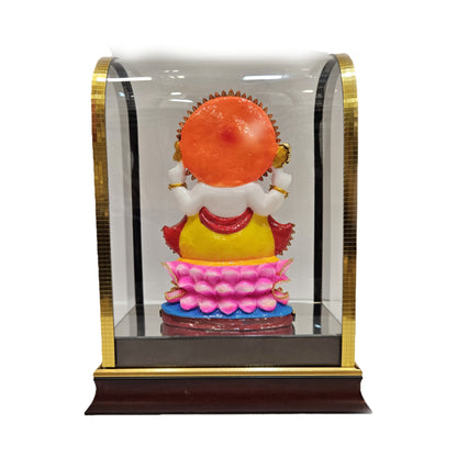24 carats gold plated vinayaka Idol in transparent protective cabin with attractive decorative stones designed Statue Showpiece