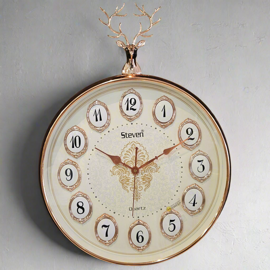 Decorative wall clock with deer antlers on a dark background