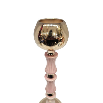 Gold and pink decorative candle holders feature a classic polished finish and are designed to securely hold tea lights