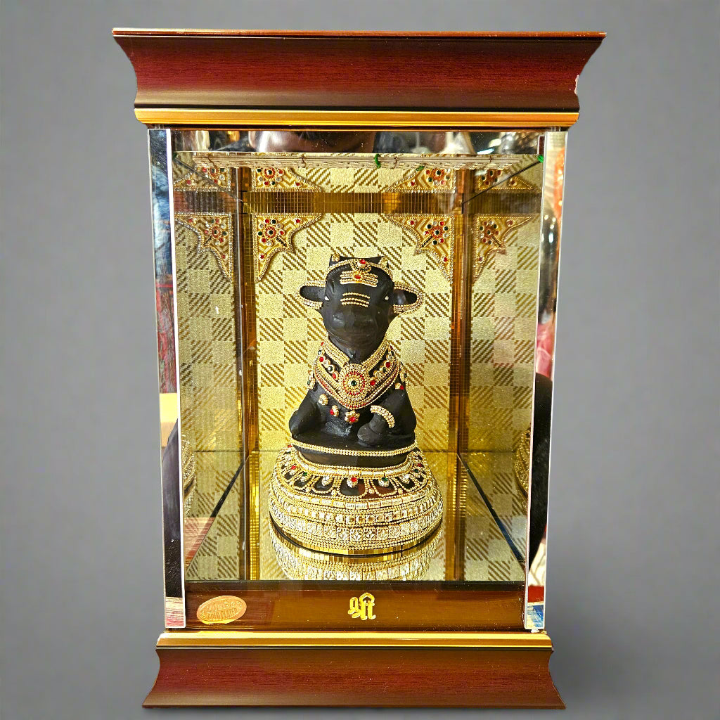 24 carats gold Plated Nandi Statue idol Decorated with attractive stones in transparent protective cabin
